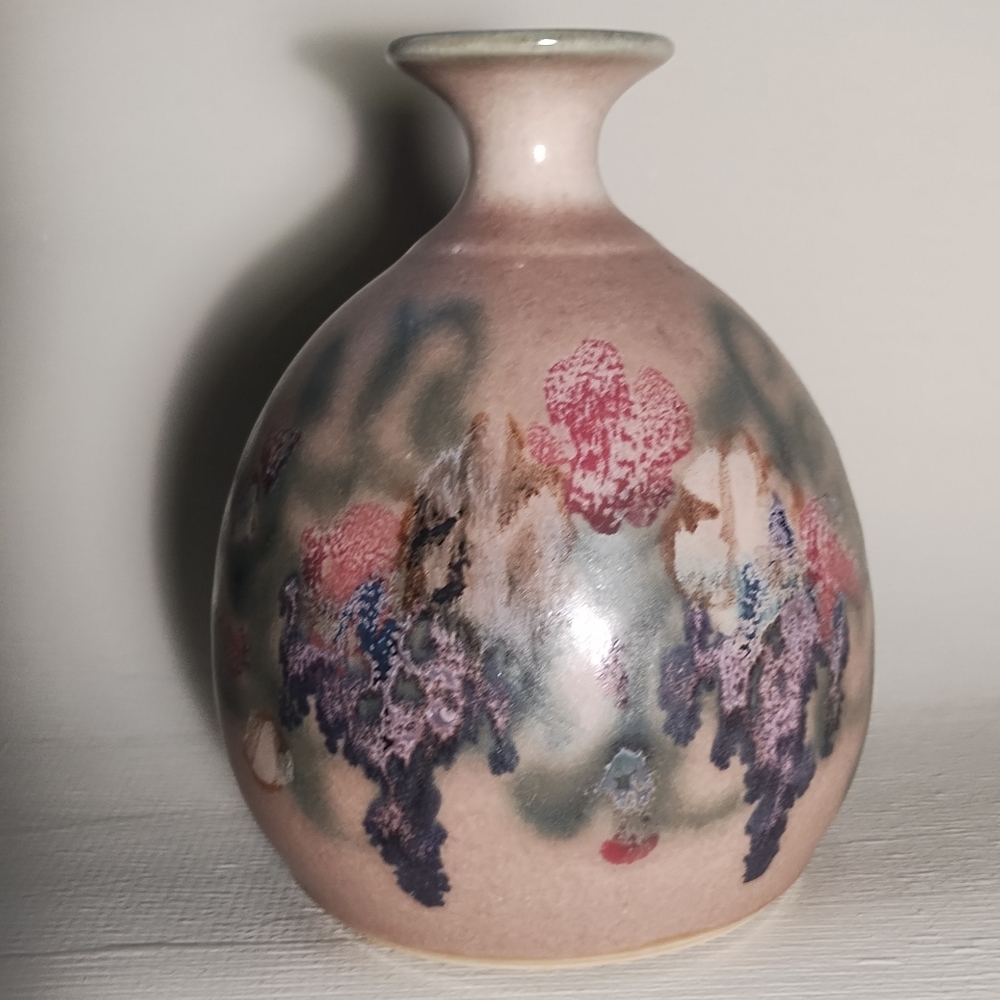 Clouds Folsom pottery vase  florals painted in an expressionistic style.